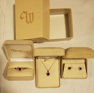 Ruby, diamond, gold heart shaped jewelry